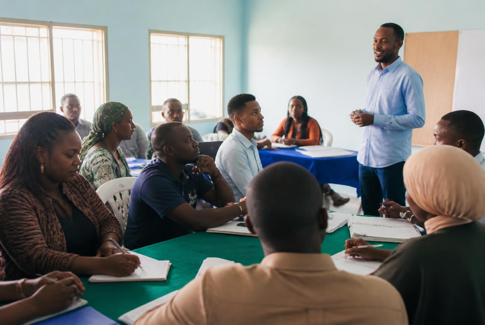 Entrepreneurs taking part in a practical learning workshop